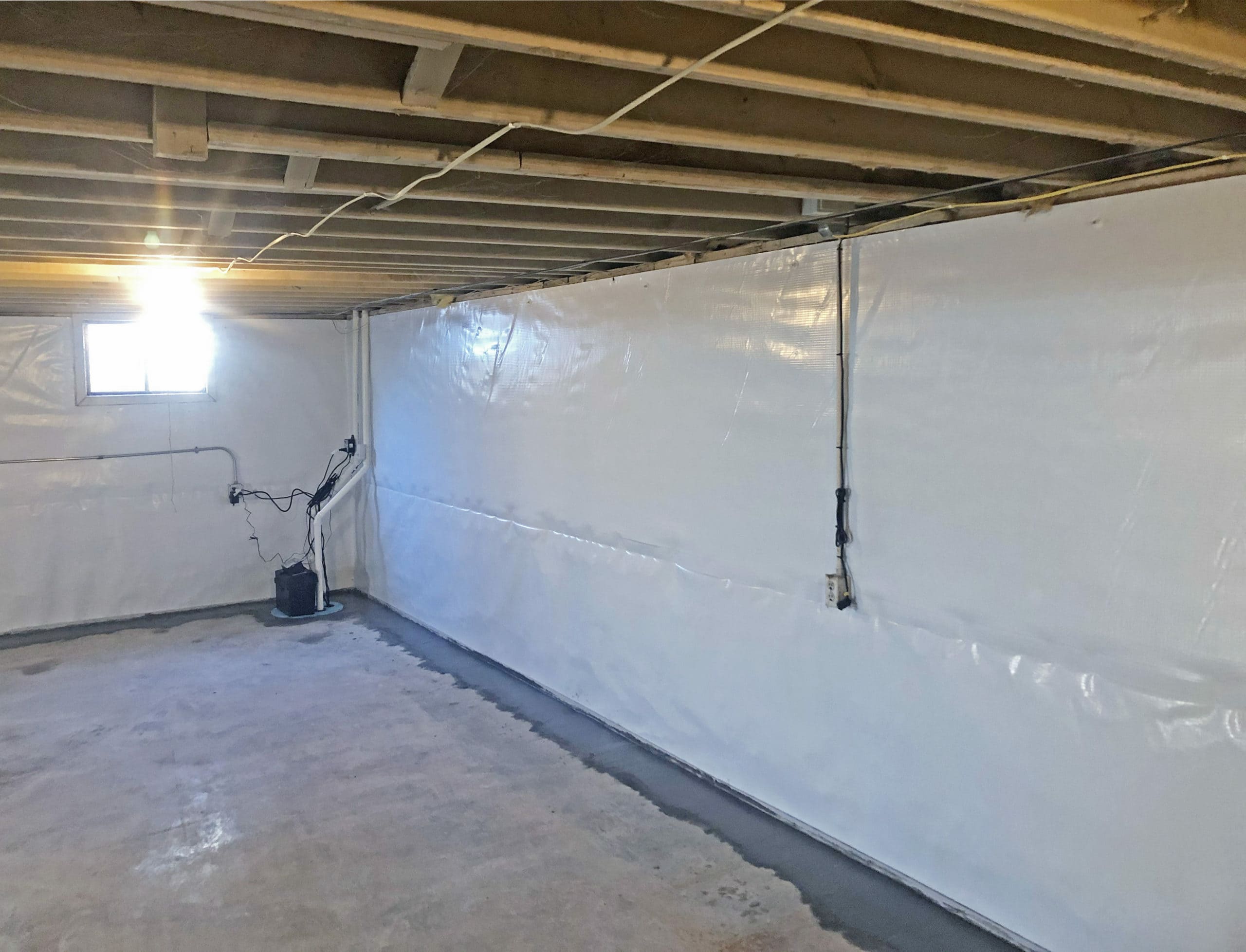 Heartland's basement waterproofing crew in Kansas City Heartland Foundation Repair basement waterproofing crew in Kansas City